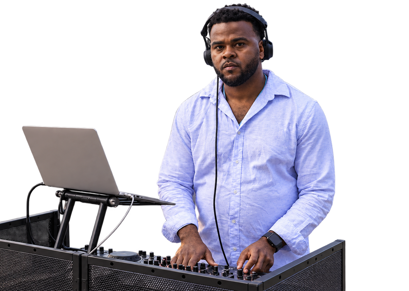 Mr. Magnum mixing behind his DJ booth